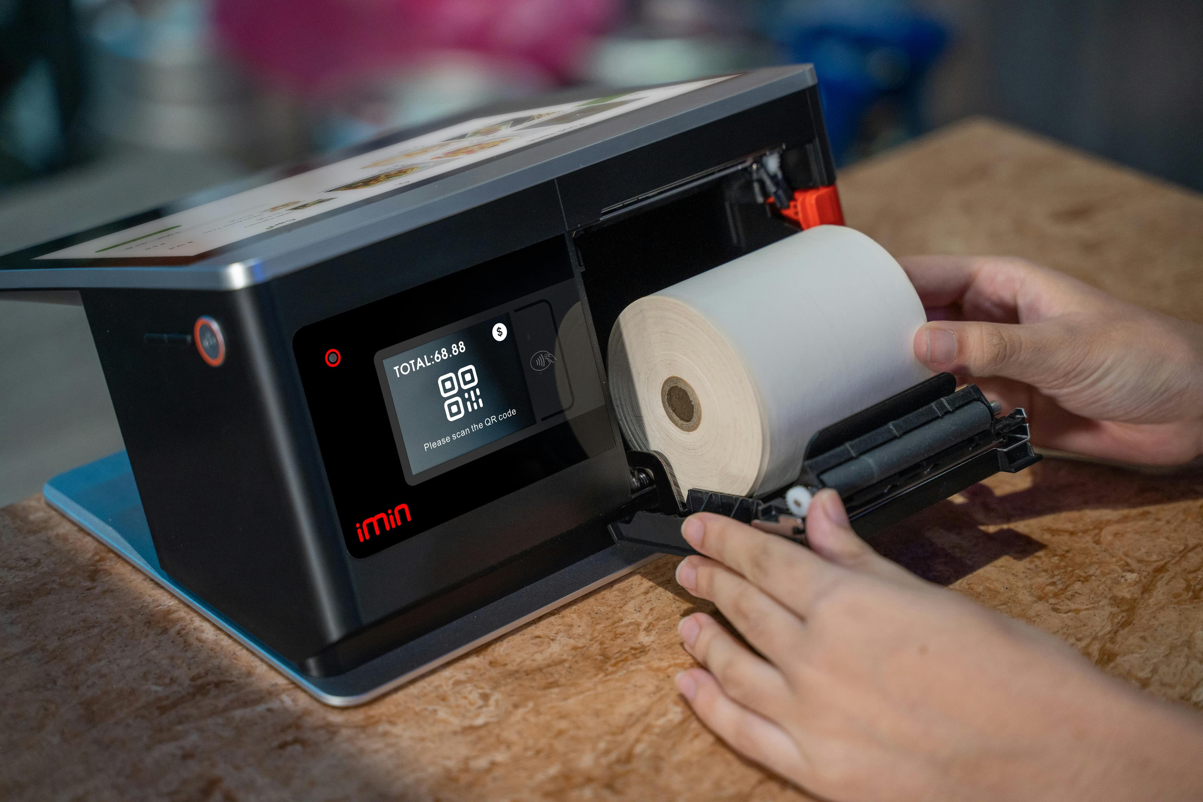 Shipping label being printed from a Shopify shipping app on a desktop printer